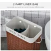 bamboo-laundry-hamper-lid_4 Open two-section fabric liner with a center divider inside a bamboo basket