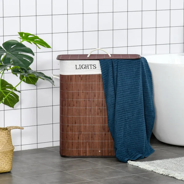 bamboo-laundry-hamper-lid_8 Brown two-compartment hamper with a blue towel draped over the lid