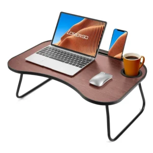foldable-lap-desk-bed_2 foldable lap desk folded and standing beside a bed with pillows and blankets