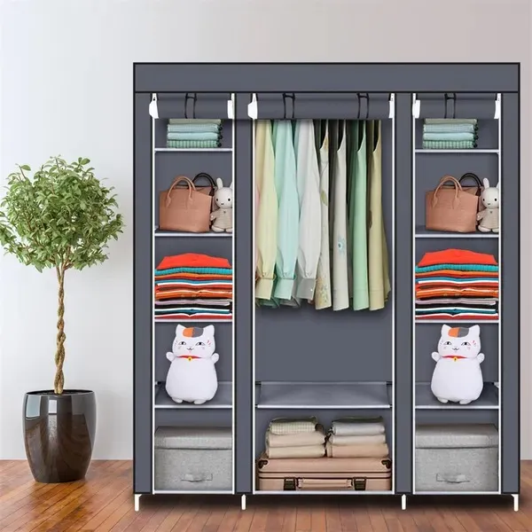 portable-closet-organizer-wardrobe_1 Gray portable closet organizer in a bedroom holding hanging clothes and folded stacks