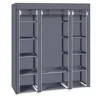portable-closet-organizer-wardrobe_3 Angled view showing the center hanging bay and two side columns of fabric shelves
