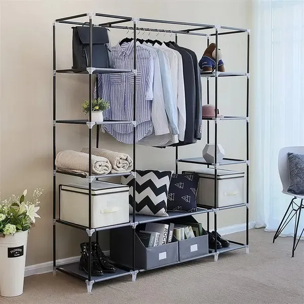 portable-closet-organizer-wardrobe_4 Steel frame with the fabric cover removed, loaded with shirts, bins and shoes